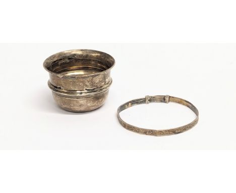 An early 20th century silver salt seller, Birmingham. With a silver baby bangle by Henry Griffith &amp; Sons Ltd. Birmingham,