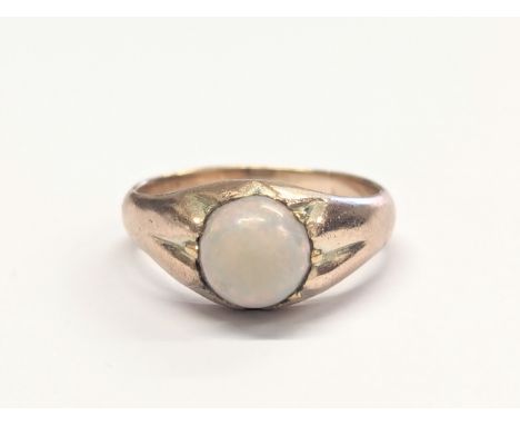 A 9ct gold and opal ring. 4.76g. Size UK N. 