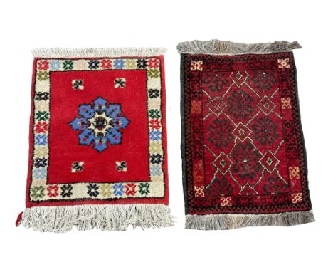 2 small vintage hand knotted Afghan mats. 