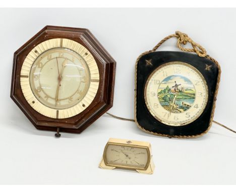 Vintage clocks and a Thermometer. A Magneta wall clock, pat 571849. A Dutch rope wall clock, a Smiths Bakelite Thermometer. 