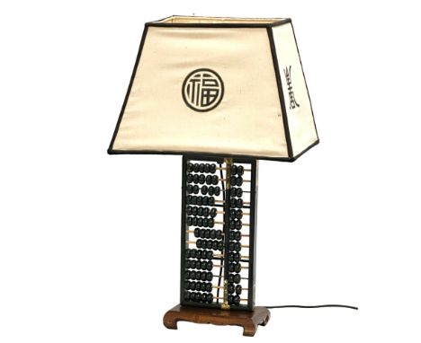 A large Chinese brass bound abacus table lamp. 44x31x74cm 