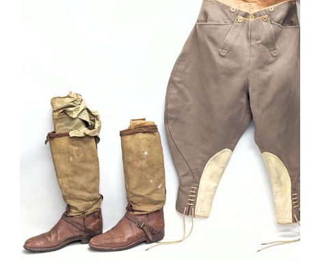 A pair of vintage horse riding / equestrian trousers and a pair of vintage horse riding boots. 
