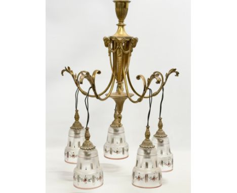 A large good quality vintage brass chandelier with etched glass shades and rams head masks. 100cm hanging. 