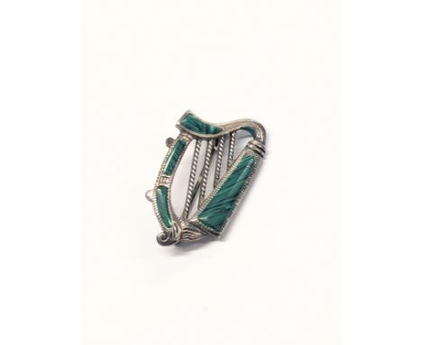 A silver and malachite Celtic harp brooch. 6.57g. 