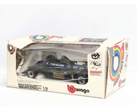 A Burago model car of Lotus MK4 1979, Martini-Tissot in box. Grand-Prix. 1/14 scale. Box measures 36x19x16cm 