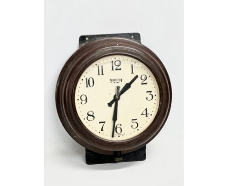 A vintage Smiths Bakelite wall clock. 29x32cm 