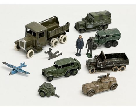 A collection of vintage Britains and Dinky military vehicles and figures. 