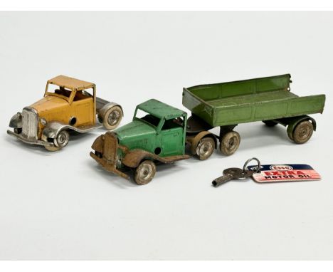 2 vintage Tri-ang Minic Toys tinplate mechanical trucks and trailer. 1940-1950. 19cm including trailer. 