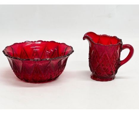 An early 20th century ‘Little Jewel’ pressed Ruby Glass milk jug and bowl by Imperial Glass Company. 15x6cm. 