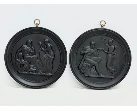 A pair of ceramic wall plaques. In the manner of Bertel Thorvaldsen. 16x17cm 