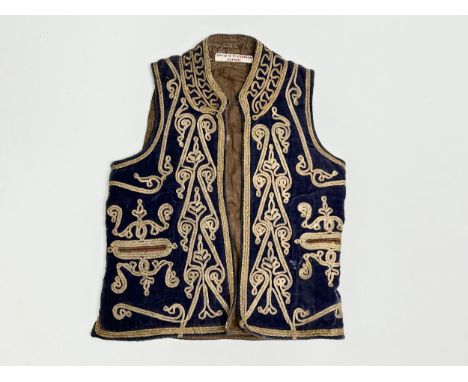 A vintage Afghan embroidered vest. David W. McCormick School. 