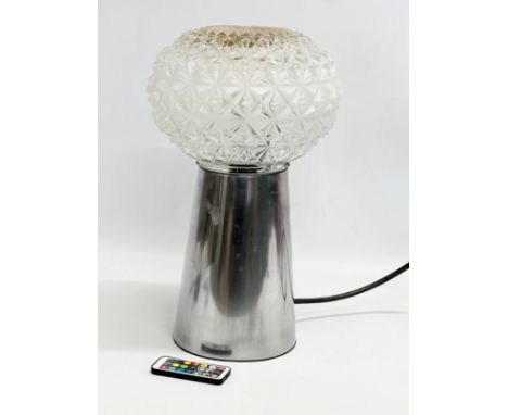 A professionally made Steampunk lamp with multicoloured bulb and remote. 23x38cm 