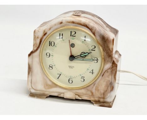 A vintage Smiths Bakelite marble effect mantle clock. Model CA. 13x7x13cm 