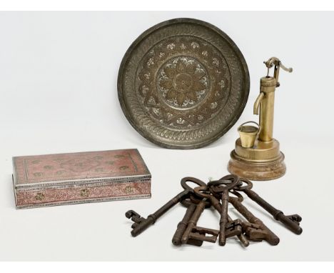 A job lot. A vintage Indian cigarette box, 19th century keys, a small vintage brass water pump 