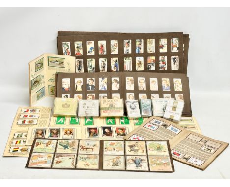 A large collection of vintage cigarette cards and albums with unopened and empty cigarettes. Black Cat Virginia cigarettes (f