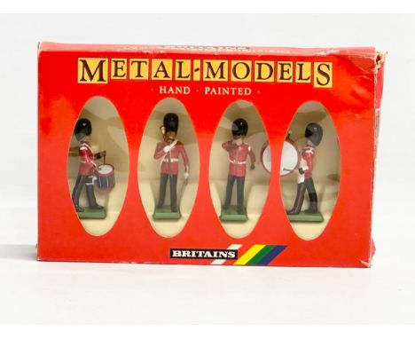 A Britains Metal Models Hand Painted Scots Guards Drum and Bugle Set. 