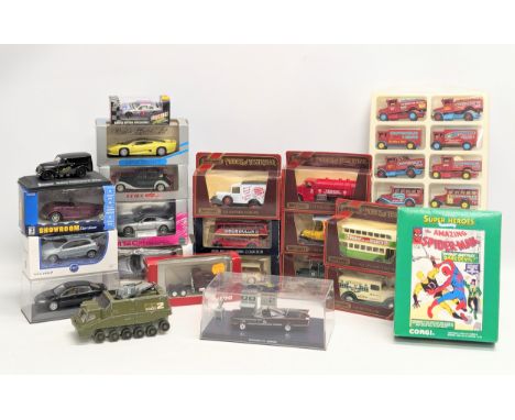 A collection of models. Including MatchBox Models of Yesteryear, Minichamps, Corgi Marvel Superheroes, Dinky, Batman mobile, 