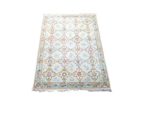 A large vintage rug. 370x270cm 