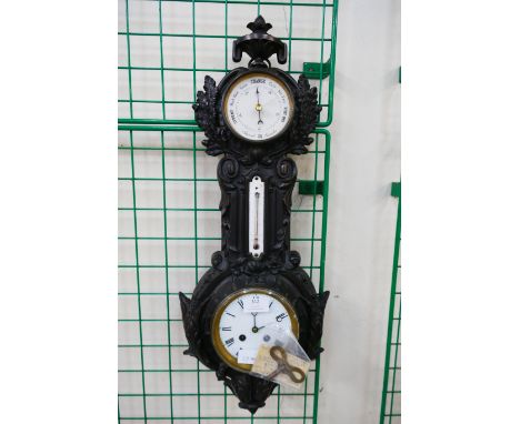 A Victorian cast iron Coalbrookdale style barometer 
