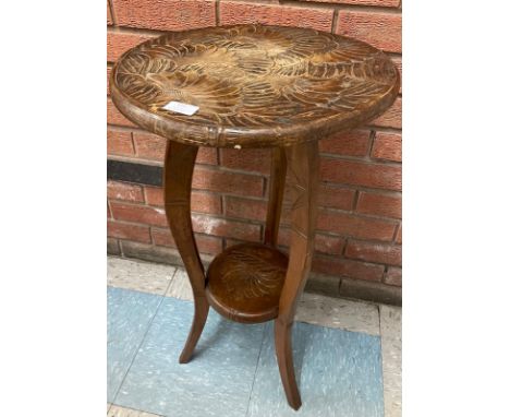 A Liberty &amp; Co. Japanese range carved wood occasional table 