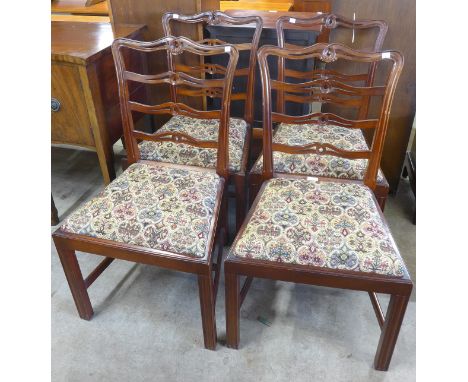 A set of four Chippendale style mahogany dining chairs 
