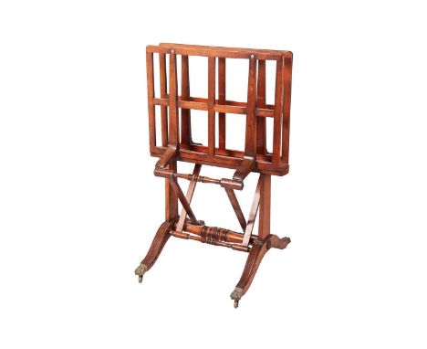 A small George IV mahogany folding artist's folio stand with a pair of hinged lath panels on trestle end supports with reeded