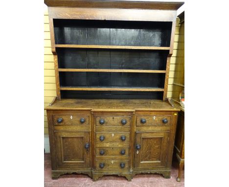 Caernarfonshire dresser circa 1850 with breakfront base below a three shelf rack, 156cms wide, 215 cms high