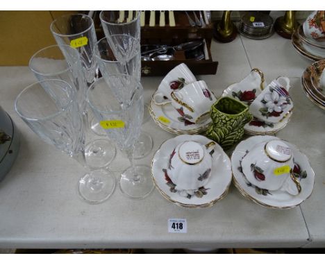 Floral decorated Newtown bone china part tea service, six glass Champagne flutes and a Sylvac jug