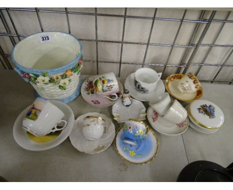 Floral encrusted planter and a mixed selection of Victorian cabinet cups and saucers etc