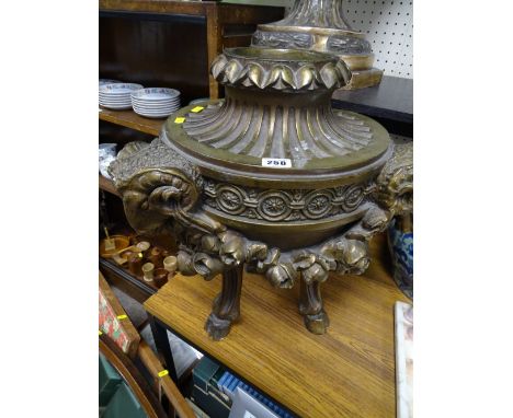 Classically styled composition gilt decorated planter with ram's mask and floral swag detail on three hoof feet