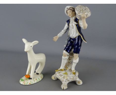 Royal Dux figurine of a young man grape harvesting and a Midwinter figure of Larry the Lamb