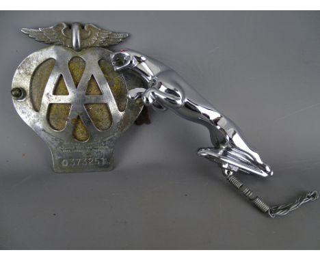 Chrome Jaguar car mascot and a vintage AA car badge no. 0373251