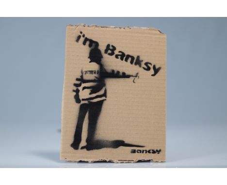 Banksy (in the style of) - "Enjoy your free Art" Souvenir from Dismaland Aerosol and stencil on cardboard, bears the words "B