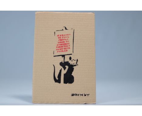 Banksy (in the style of) - "Enjoy your free Art" Souvenir from Dismaland Aerosol and stencil on cardboard, bears the words "B