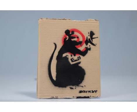 Banksy (in the style of) - "Enjoy your free Art" Souvenir from Dismaland Aerosol and stencil on cardboard, bears the words "B