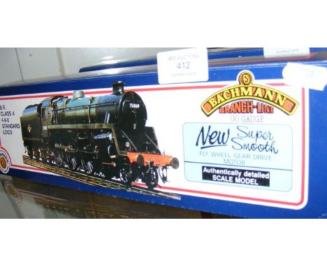 A Bachmann Locomotive and Tender - BR Class 4- Model 31-102 