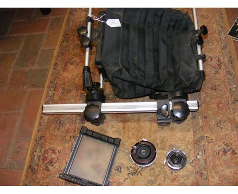 A Cambo 5 x 4 focusing camera with Schneider and Polaroid lenses  