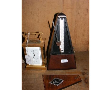 Brass cased carriage clock, together with an old metronome  