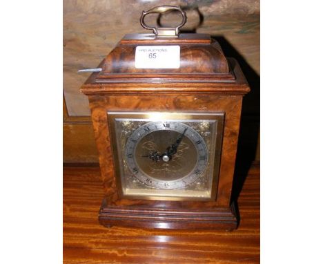 A Pressley & Son walnut cased mantel clock 