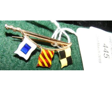 A Benzie 9ct gold enamel flag brooch 