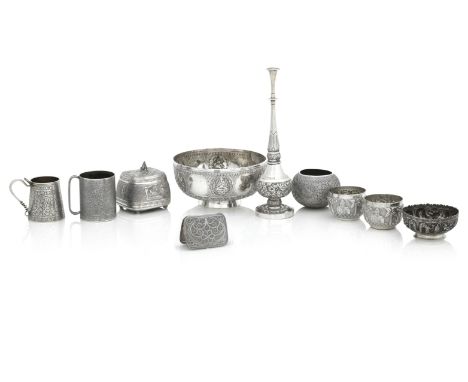 A COLLECTION OF INDIAN WHITE METAL WARESIncluding a footed rice bowl, a rosewater sprinkler of slender bulbous form, a casket