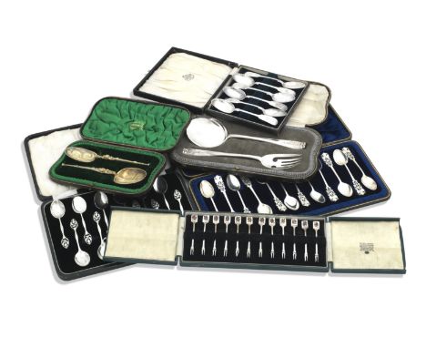 A SET OF TWELVE SILVER AND ENAMEL PICKLE FORKSGarrard,  Birmingham 1961Each terminal enamelled with a royal playing card, cas