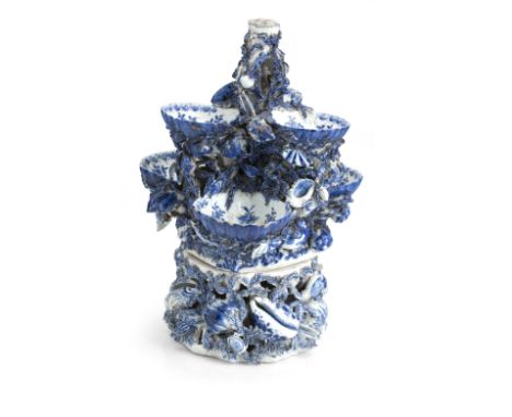 A DERBY BLUE AND WHITE PORCELAIN SWEETMEAT STAND18th centuryIn two parts, the base with an array of seashells and seaweed, th