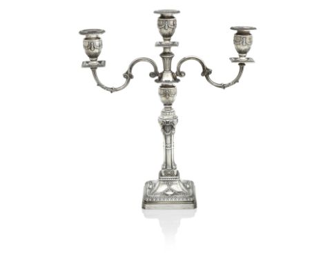 AN ELIZABETH II THREE LIGHT CANDLEABRUMBarker Ellis Silver Company, Birmingham 1967In the neoclassical style, the square pede