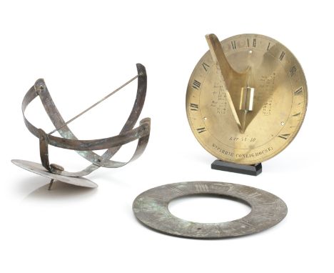 AN IRISH BRASS SUNDIAL19th centuryEngraved 'Wm Pierrie Conligh House' and 'Latitude 54, 40', 30.5 diameter, 23.5 high; togeth
