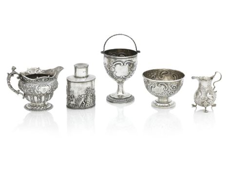 A COLLECTION OF DECORATIVE ROCOCO SILVERIncluding a George II cream jug, London 1748, on three scroll feet the baluster body 