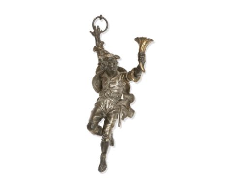 A 19TH CENTURY FRENCH PATINATED SPELTER FIGURAL WALL LIGHTModelled as a gentleman holding aloft a torch, unsigned, 27cm wide,