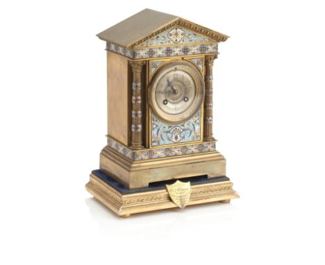 A FRENCH CHAMPLEVE BRASS MANTEL CLOCKCirca 1900Of architectural form, with silvered Arabic dial marked for 'Gibson &amp; Co, 