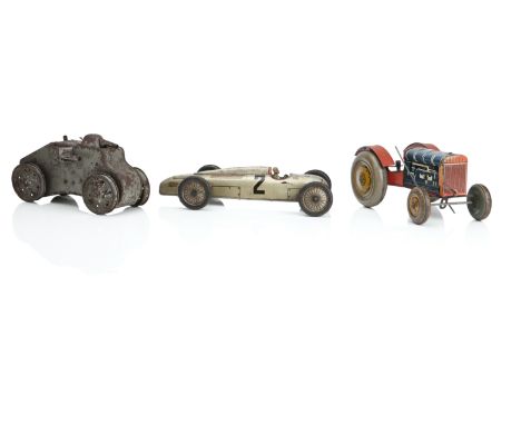 A COLLECTION OF VINTAGE TIN PLATE TOYSIncluding a A Triang clockwork tin plate tank, in grey, 13cm high, 24cm long; together 