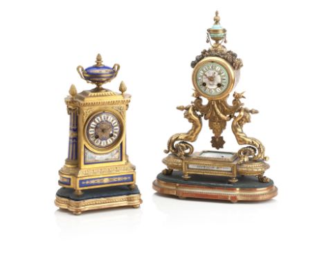 A 19TH CENTURY FRENCH PORCELAIN MOUNTED ORMOLU MANTEL CLOCKThe blue enamel dial with Roman chapter, twin train movement strik